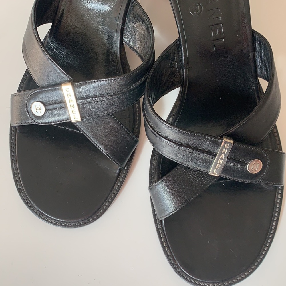 Chanel black leather slides